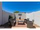 Enclosed patio features comfortable seating for entertaining and enjoying the outdoors at 5400 S Hardy Dr # 110, Tempe, AZ 85283