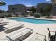 Community pool with lounge chairs offers a relaxing outdoor amenity at 5400 S Hardy Dr # 110, Tempe, AZ 85283