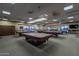 Spacious billiard room featuring multiple pool tables under bright lighting at 555 Leisure World --, Mesa, AZ 85206