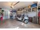 Two car garage featuring a golf cart and other equipment at 555 Leisure World --, Mesa, AZ 85206