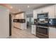 Recently remodeled kitchen featuring white cabinetry, stainless steel appliances, and recessed lighting at 555 Leisure World --, Mesa, AZ 85206