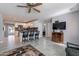 Bright living room offering an open view into the upgraded kitchen with barstool seating at 555 Leisure World --, Mesa, AZ 85206