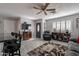 Bright living room offering a spacious layout with an open view into the kitchen area at 555 Leisure World --, Mesa, AZ 85206