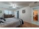 Another view of the cozy main bedroom features wood floors, and decor at 555 Leisure World --, Mesa, AZ 85206