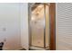 Shower stall featuring translucent doors and wood trim at 555 Leisure World --, Mesa, AZ 85206