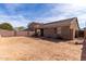 Large backyard space with covered patio offers great outdoor living and landscaping potential at 562 W Enchanted Desert Dr, Casa Grande, AZ 85122