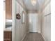 Hallway view into a home featuring tile floors and neutral paint at 562 W Enchanted Desert Dr, Casa Grande, AZ 85122