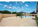 Expansive backyard featuring a pool, pergola, and ample patio space for outdoor entertainment at 5624 E Garnet Ave, Mesa, AZ 85206