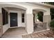 Inviting entryway with elegant arches, offering a warm welcome at 5624 E Garnet Ave, Mesa, AZ 85206