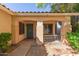 Inviting front porch with a cozy seating area and security door at 5624 E Garnet Ave, Mesa, AZ 85206