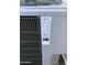 Close up shot of the HVAC unit with detailed equipment specifications and manufacturer's labeling at 5624 E Garnet Ave, Mesa, AZ 85206