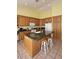 Functional kitchen with island, great counter space, and storage at 5624 E Garnet Ave, Mesa, AZ 85206