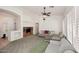 Living Room featuring vaulted ceilings and view of built-in shelves at 5624 E Garnet Ave, Mesa, AZ 85206