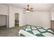 Spacious main bedroom featuring high ceilings and an ensuite bathroom at 5624 E Garnet Ave, Mesa, AZ 85206