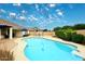 Inviting backyard features a sparkling pool and patio area ideal for relaxation and outdoor entertainment at 5624 E Garnet Ave, Mesa, AZ 85206