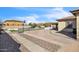 Expansive backyard with a pool, hot tub, basketball court, and outdoor kitchen at 5634 N 82 Ave, Glendale, AZ 85303