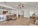 Open living area with a modern ceiling fan and lots of natural light at 5634 N 82 Ave, Glendale, AZ 85303