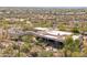 Stunning aerial view of a luxury home showcasing its unique architecture and sprawling desert landscape at 6432 E Old Paint Trl, Carefree, AZ 85377