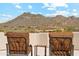 Outdoor balcony with seating offering expansive mountain views under a blue sky at 6432 E Old Paint Trl, Carefree, AZ 85377