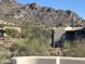 Desert homes with hill views, complemented by native vegetation at 6432 E Old Paint Trl, Carefree, AZ 85377