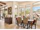 Dining room featuring a table with seating and large windows with a picturesque view at 6432 E Old Paint Trl, Carefree, AZ 85377