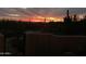 View of a desert sunset through the neighborhood gate at 6432 E Old Paint Trl, Carefree, AZ 85377