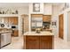 Kitchen featuring a central island, stainless steel appliances, and ample cabinet space at 6432 E Old Paint Trl, Carefree, AZ 85377