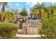 Outdoor kitchen with a built-in grill, perfect for enjoying the gorgeous pool area at 6432 E Old Paint Trl, Carefree, AZ 85377