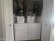 Laundry closet with stacked washer and dryer at 650 N Hawes Rd # 2852, Mesa, AZ 85207