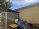 Functional outdoor shed providing ample storage, neatly organized with bins and containers against the house at 650 N Hawes Rd # 2852, Mesa, AZ 85207