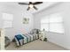 Bright bedroom with natural light, ceiling fan, and modern decor at 759 E Zesta Ln # 104, Gilbert, AZ 85297