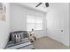 bedroom featuring modern decor, natural light, and ample closet space at 759 E Zesta Ln # 104, Gilbert, AZ 85297