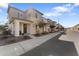 Attractive two-story home with a mix of stone and stucco exterior with a landscaped front yard at 759 E Zesta Ln # 104, Gilbert, AZ 85297