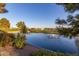 Scenic pond view with a fountain, lush landscaping, and serene surroundings, perfect for relaxation at 7830 E Camelback Rd # 108, Scottsdale, AZ 85251