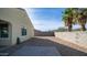 Backyard featuring a gravel ground cover, block wall, a patio, and mountain views at 821 S Parker Pl, Casa Grande, AZ 85122