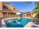 Exterior view of pool with patio pergola, and backyard cabana at 8305 W Pioneer St, Tolleson, AZ 85353