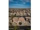 An elevated view of homes with access to a waterway with lush landscaping, tile roofs, and community feel at 856 E Indian Wells Pl, Chandler, AZ 85249