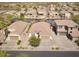 Aerial shot of neighborhood streets and homes that offers a view of well-kept landscape at 856 E Indian Wells Pl, Chandler, AZ 85249