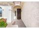 Inviting front entrance with decorative stone accents, a covered porch, and well-maintained landscaping at 856 E Indian Wells Pl, Chandler, AZ 85249