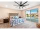 Relaxing main bedroom with backyard pool view, a stylish chair and lots of space at 856 E Indian Wells Pl, Chandler, AZ 85249