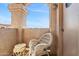 Balcony featuring wicker chair and views of the blue sky at 9151 W Greenway Rd # 258, Peoria, AZ 85381