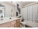 Bathroom with vanity, a shower-tub combo, and neutral decor at 9151 W Greenway Rd # 258, Peoria, AZ 85381