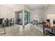 Living Room features tile floors, ceiling fan, neutral colors, and sliding door to a patio at 9151 W Greenway Rd # 258, Peoria, AZ 85381