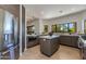 Modern kitchen features stainless steel appliances, an island, and ample counter space with natural light at 9214 N 83Rd St, Scottsdale, AZ 85258