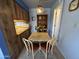 Cozy dining area with table, chairs, and colorful hanging light fixture; perfect for intimate meals at 925 E Lancaster Cir, Florence, AZ 85132