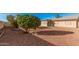 The backyard is desert landscaped for low maintenance, and includes an air conditioning unit at 9283 W Rafael Dr, Arizona City, AZ 85123