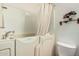 Accessible bathroom with a walk-in tub, shower, and toilet at 9283 W Rafael Dr, Arizona City, AZ 85123