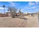 Beautiful desert-landscaped front yard with rock accents and a view of blue skies at 9410 N 18Th St, Phoenix, AZ 85020