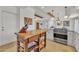 Kitchen featuring granite countertops, butcher block island, and stainless steel Viking range at 9410 N 18Th St, Phoenix, AZ 85020