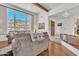 Bright living room with views, wood beam ceiling and comfortable seating at 9410 N 18Th St, Phoenix, AZ 85020